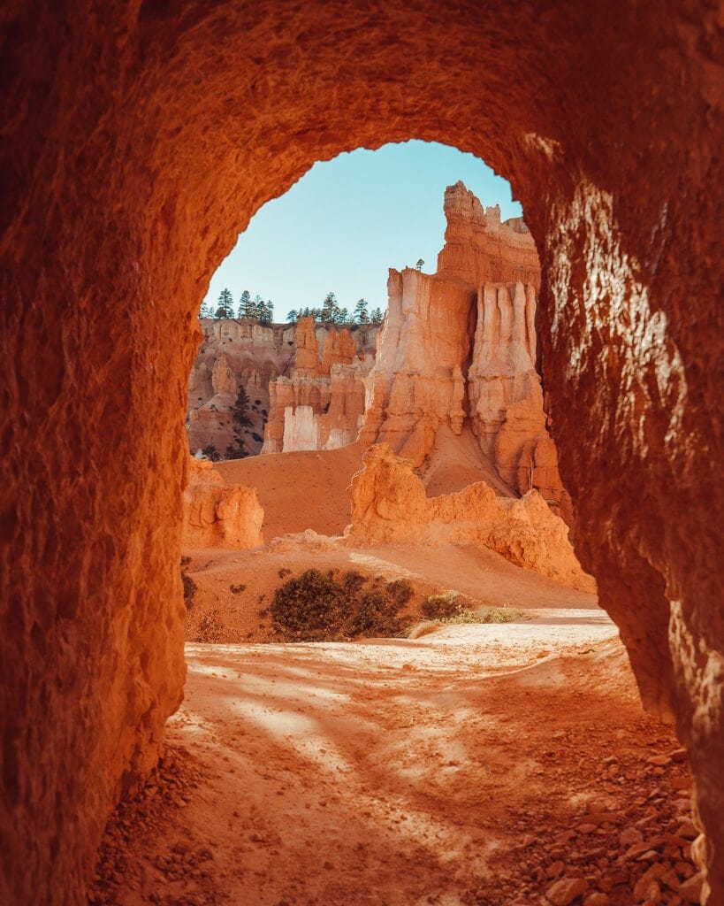 view of a tunnel in the navajo loop trail in bryce national park utah