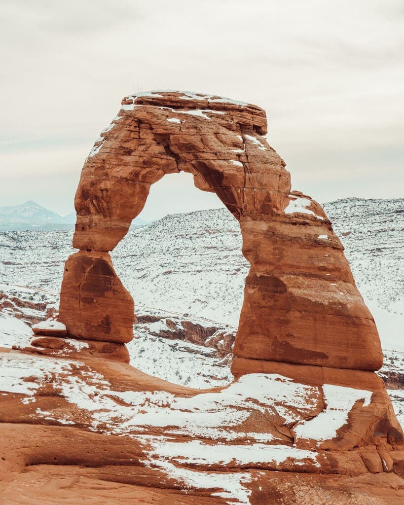 view of delicate arch during the winter season in arches national park utah