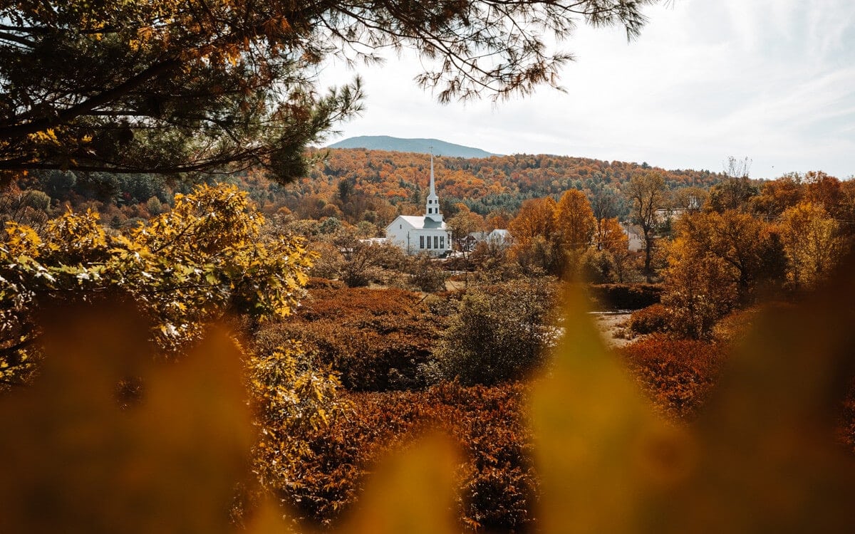 view of the community church in stowe vermont in the fall